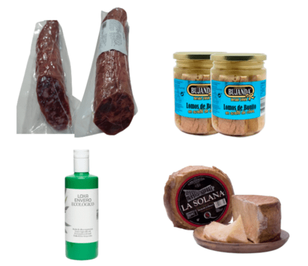 Cesta de navidad compuesta por embutidos ibericos, bonito del norte, queso de oveja envejecido en manteca y aceite de oliva ecologico